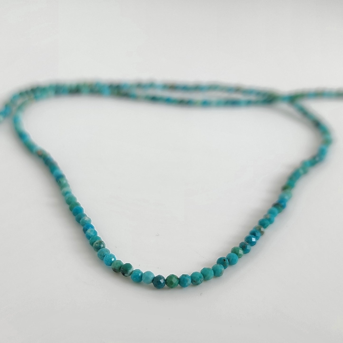 Turquoise DC Faceted 2mm