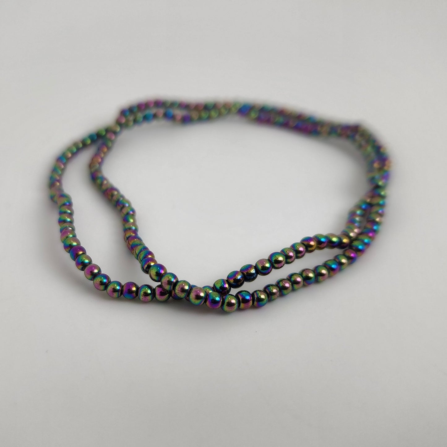 Rainbow Vacuum Hematite Round 2mm
