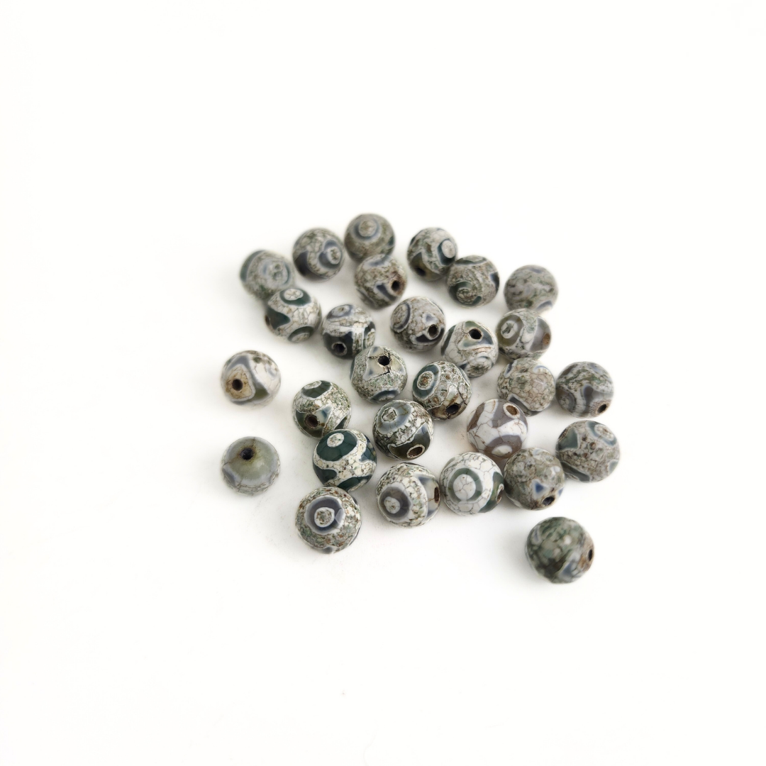 Dzi Aqua/White Faceted Round 8mm