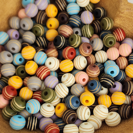 Assorted Carved Stripe Schima Round 9mm