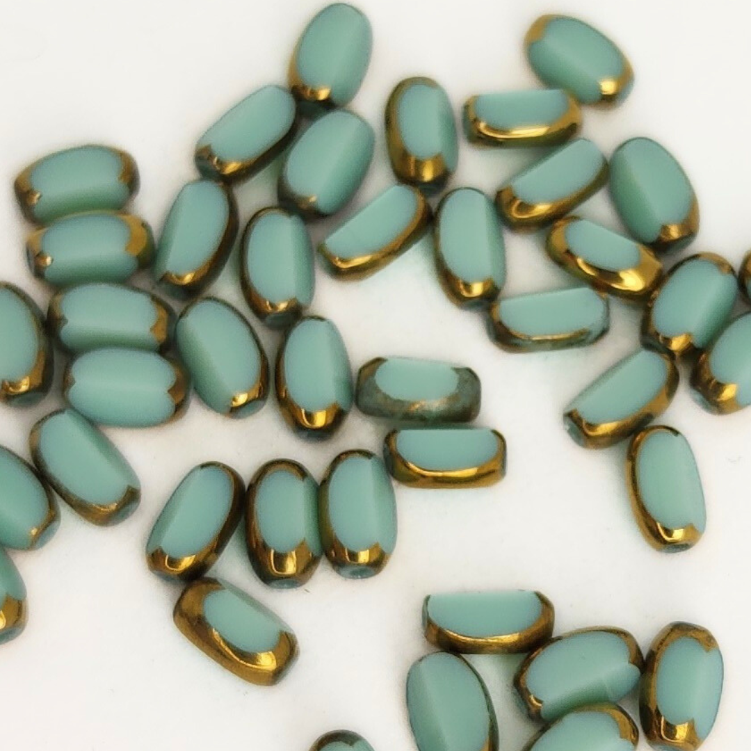 Gold Edged Faceted Ovals 4x6mm