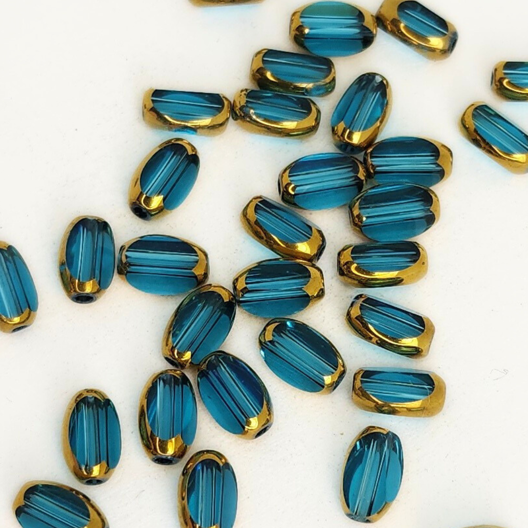 Gold Edged Faceted Ovals 4x6mm