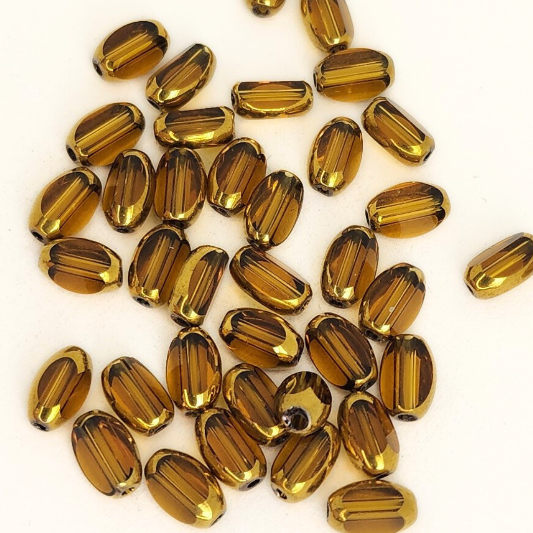 Gold Edged Faceted Ovals 4x6mm