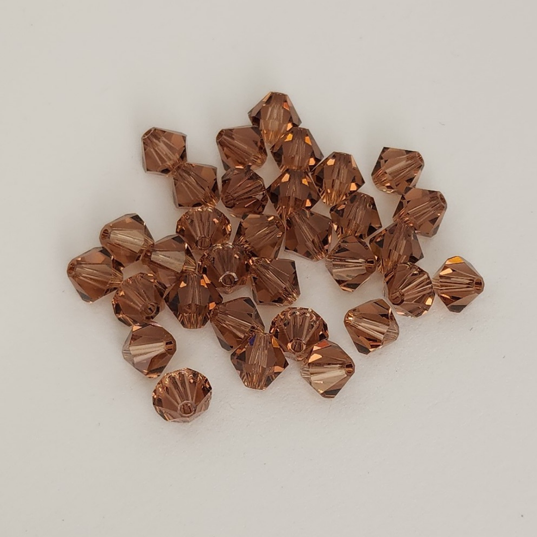Bicone 6mm A-M