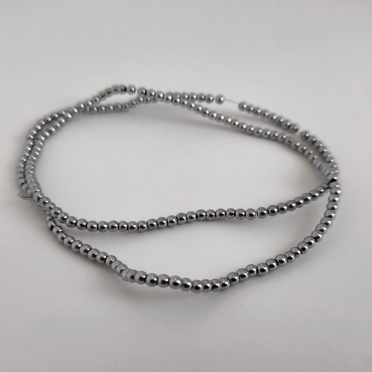 Silver Vacuum Hematite Round 2mm
