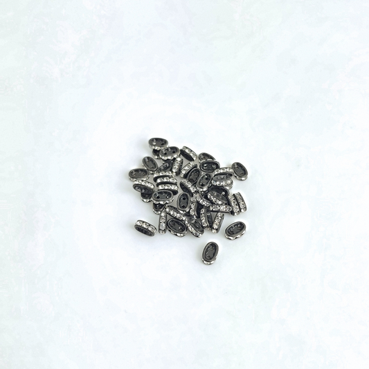 2 Hole Oval 7x4mm
